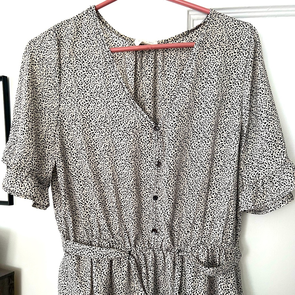 Black-and-white peplum blouse – size large